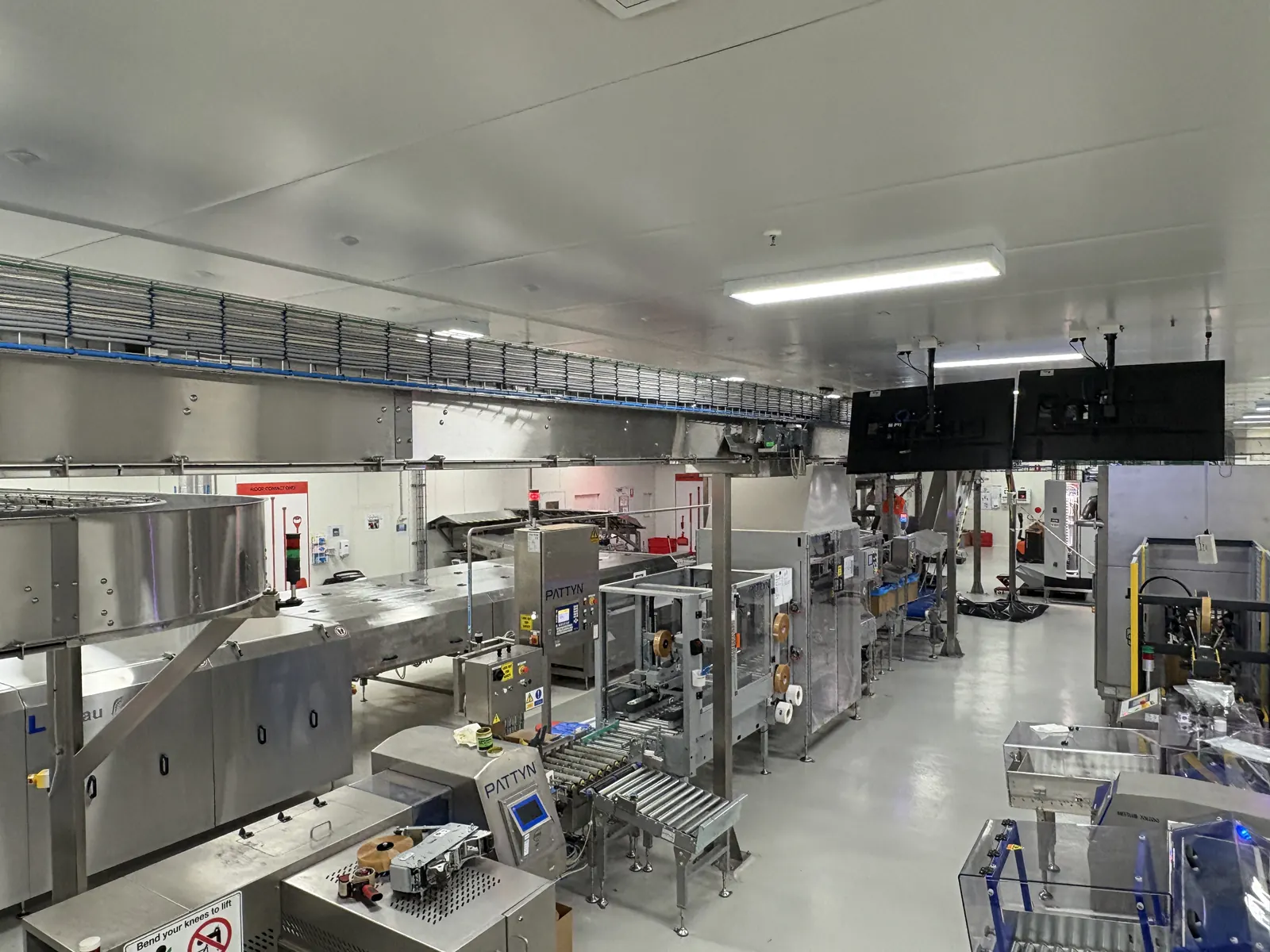 Factory electrical fit-out with cable tray and production equipment