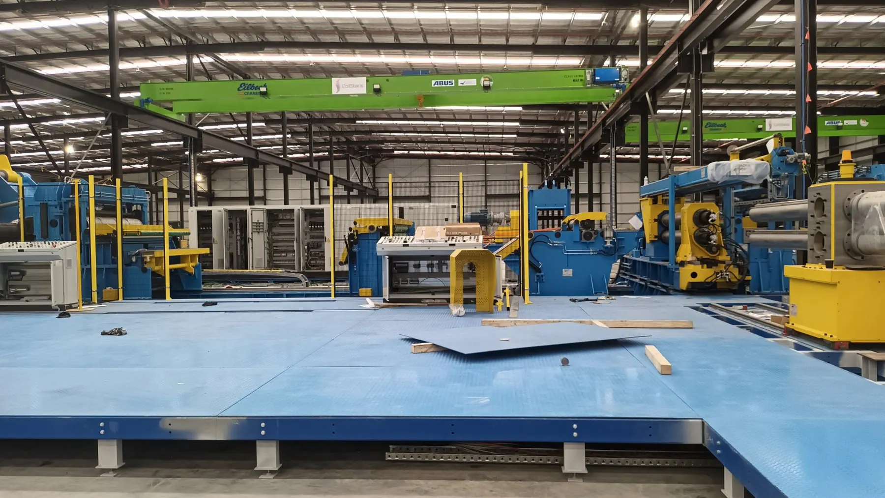 Industrial production area with machinery and electrical infrastructure